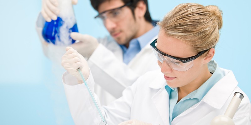 Flu virus experiment – scientist in laboratory